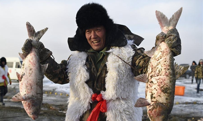 In pics: winter fishing at Wolong Lake in China's Liaoning