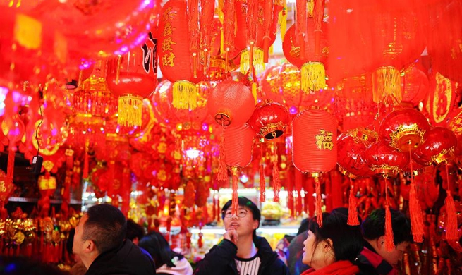 People make preparations to celebrate Spring Festival