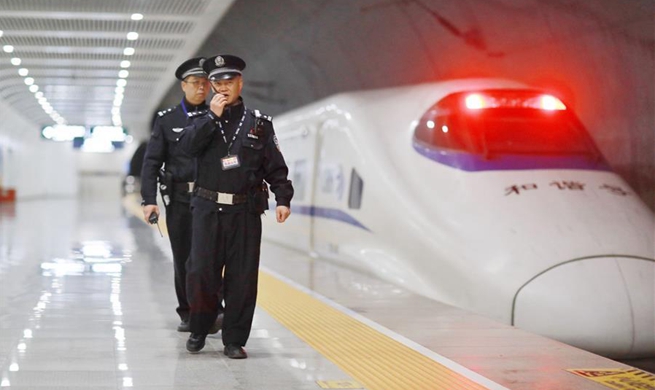 Police stick to posts during Spring Festival travel rush in railway station in China's Guizhou