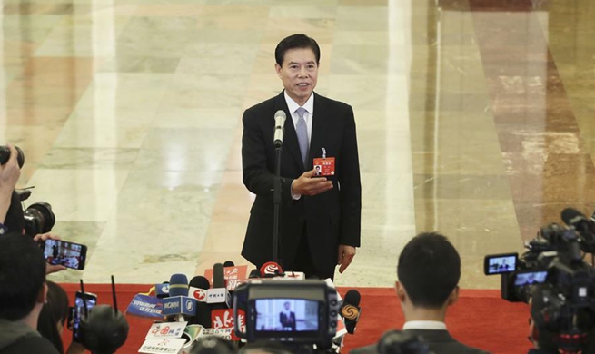 Ministers receive interview after opening meeting of second session of 13th NPC