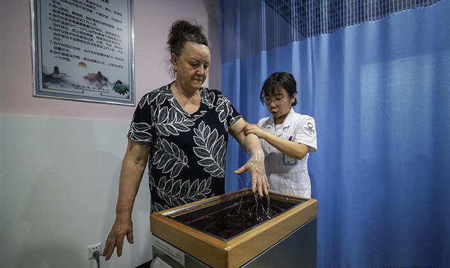 Hospital featuring TCM therapy attracts many Russian patients in NE China